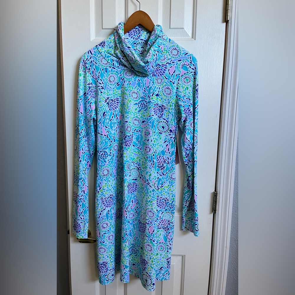 Beautiful dress never worn  with built in mask high collar